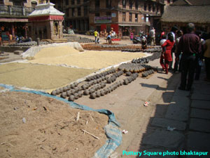 Potters drying decorative items made by soil clay.